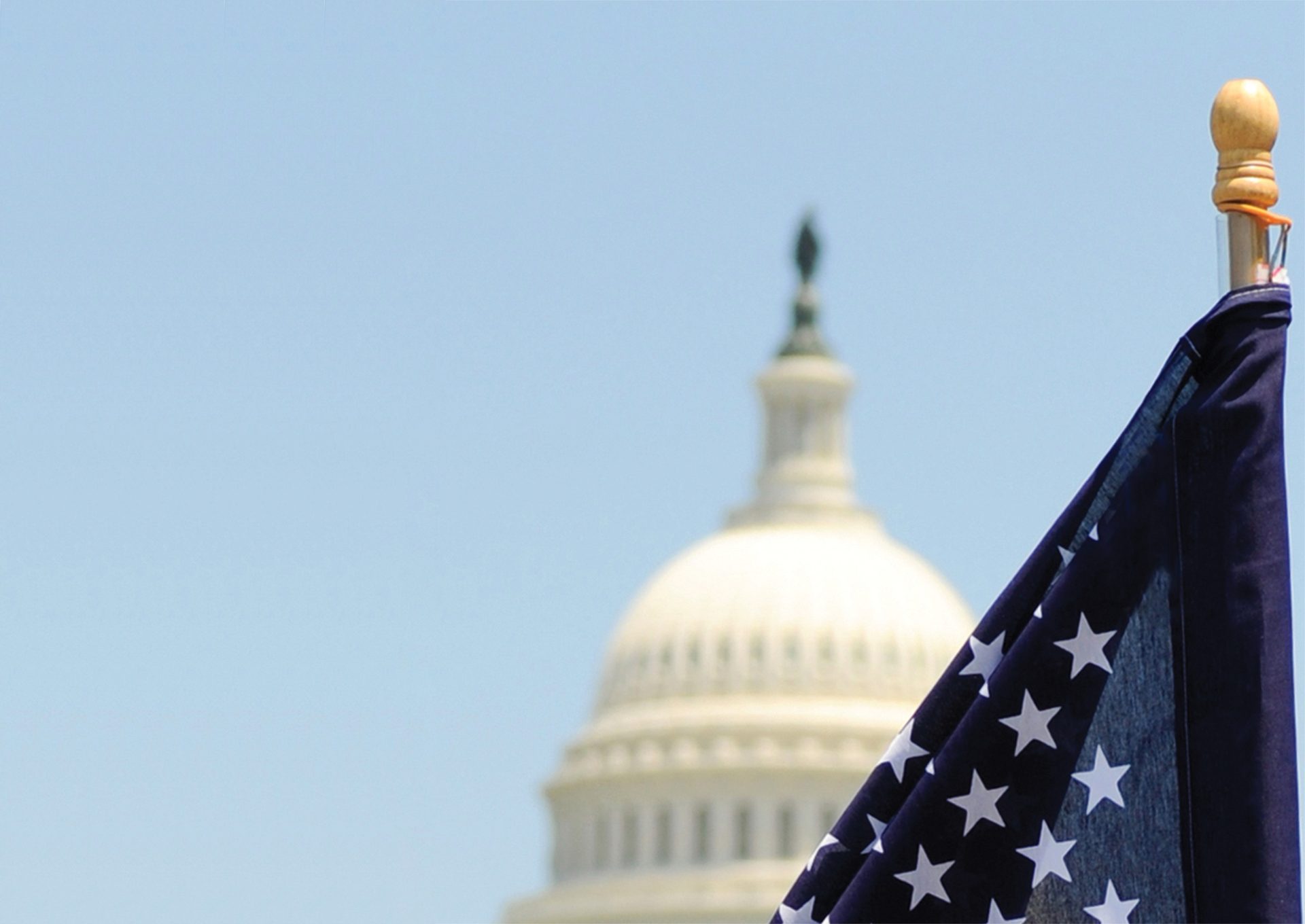 US Capitol with flag