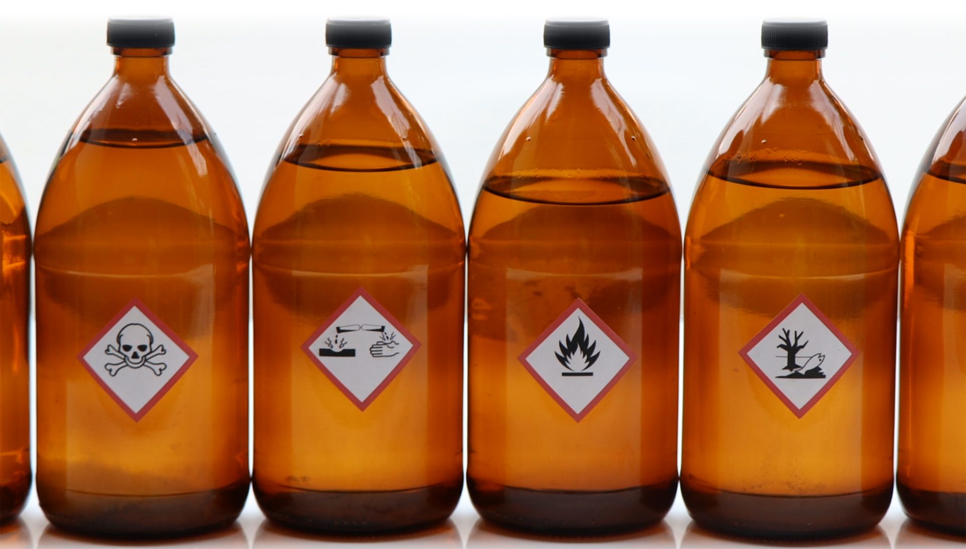 Warning symbol for chemical hazard on chemical container