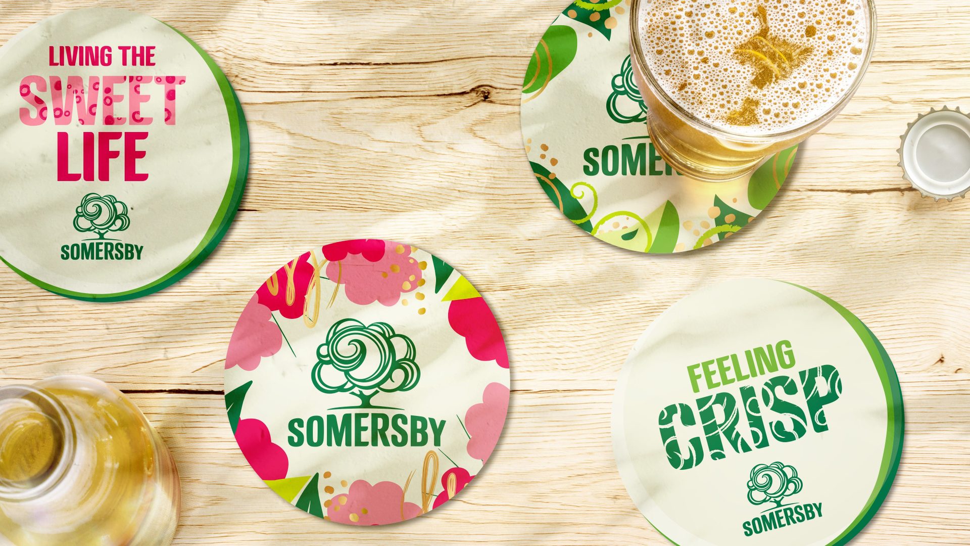 Several drink coasters featuring Somersby branding on wooden table