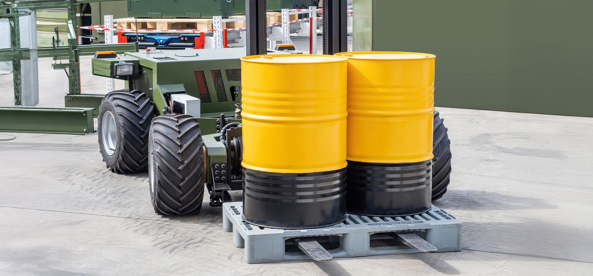 Transportation and loading of chemicals in yellow barrels