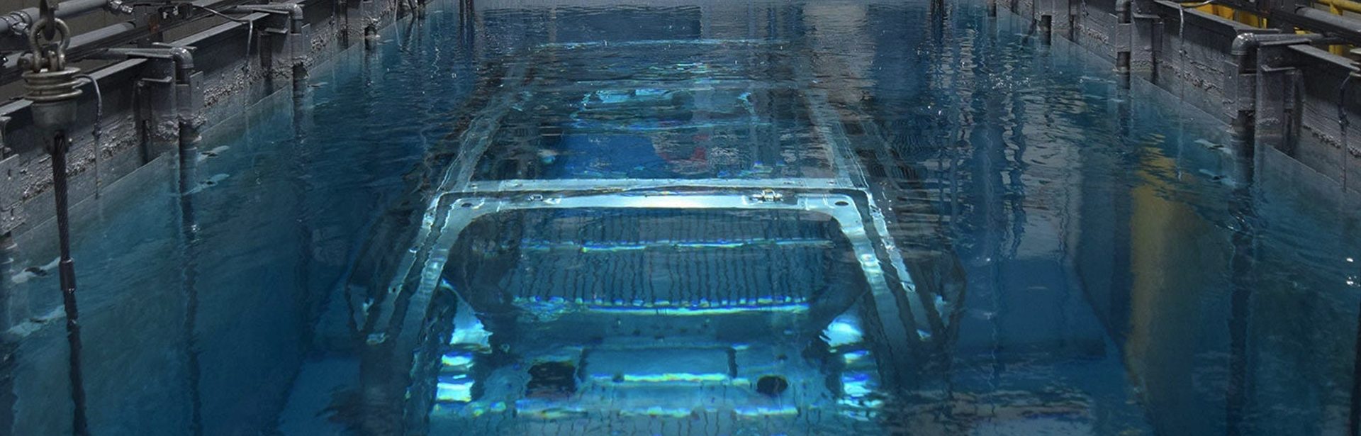 car being dunked for surface preparation