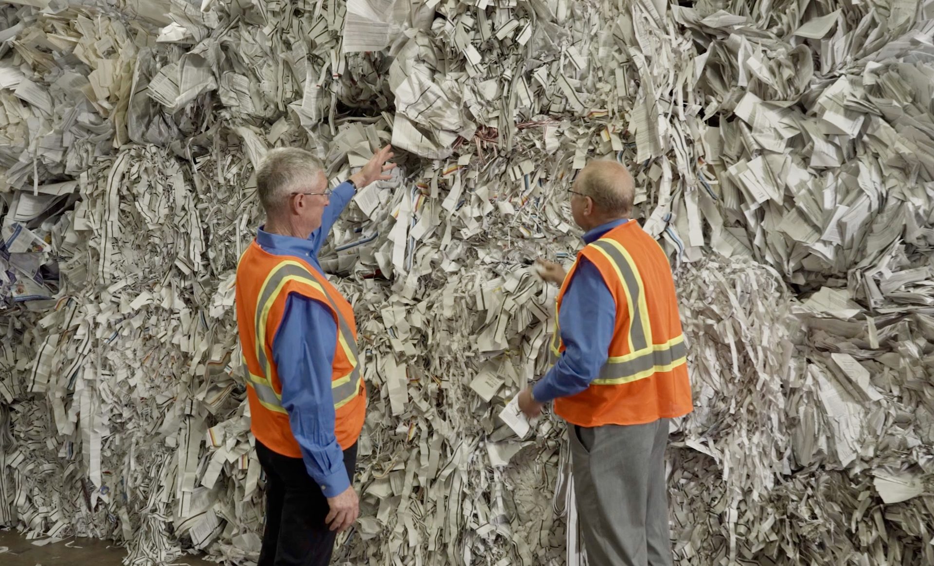 Don Gaines, CEO of Mid America Paper Recycling, inspects paper bales at his facility in Chicago