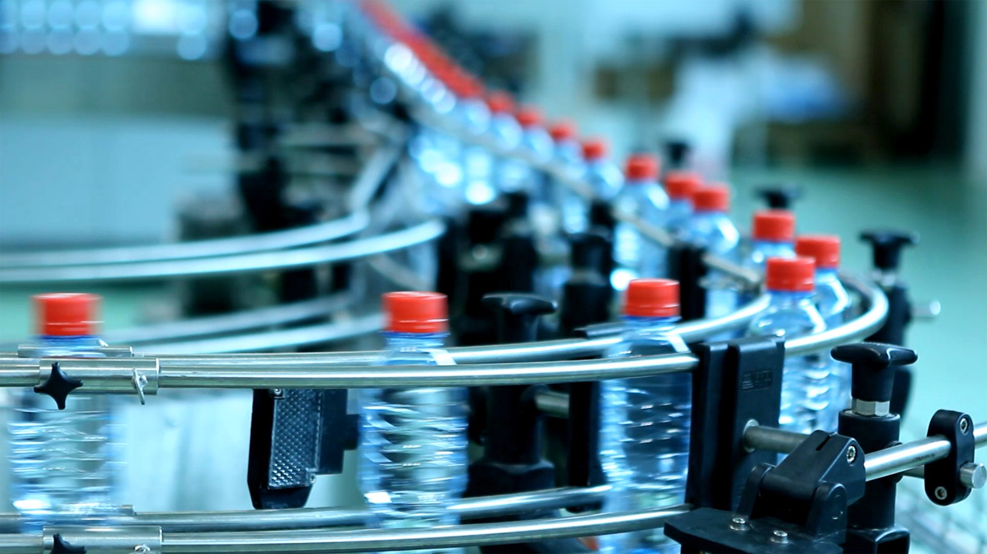Water bottles on packaging equipment