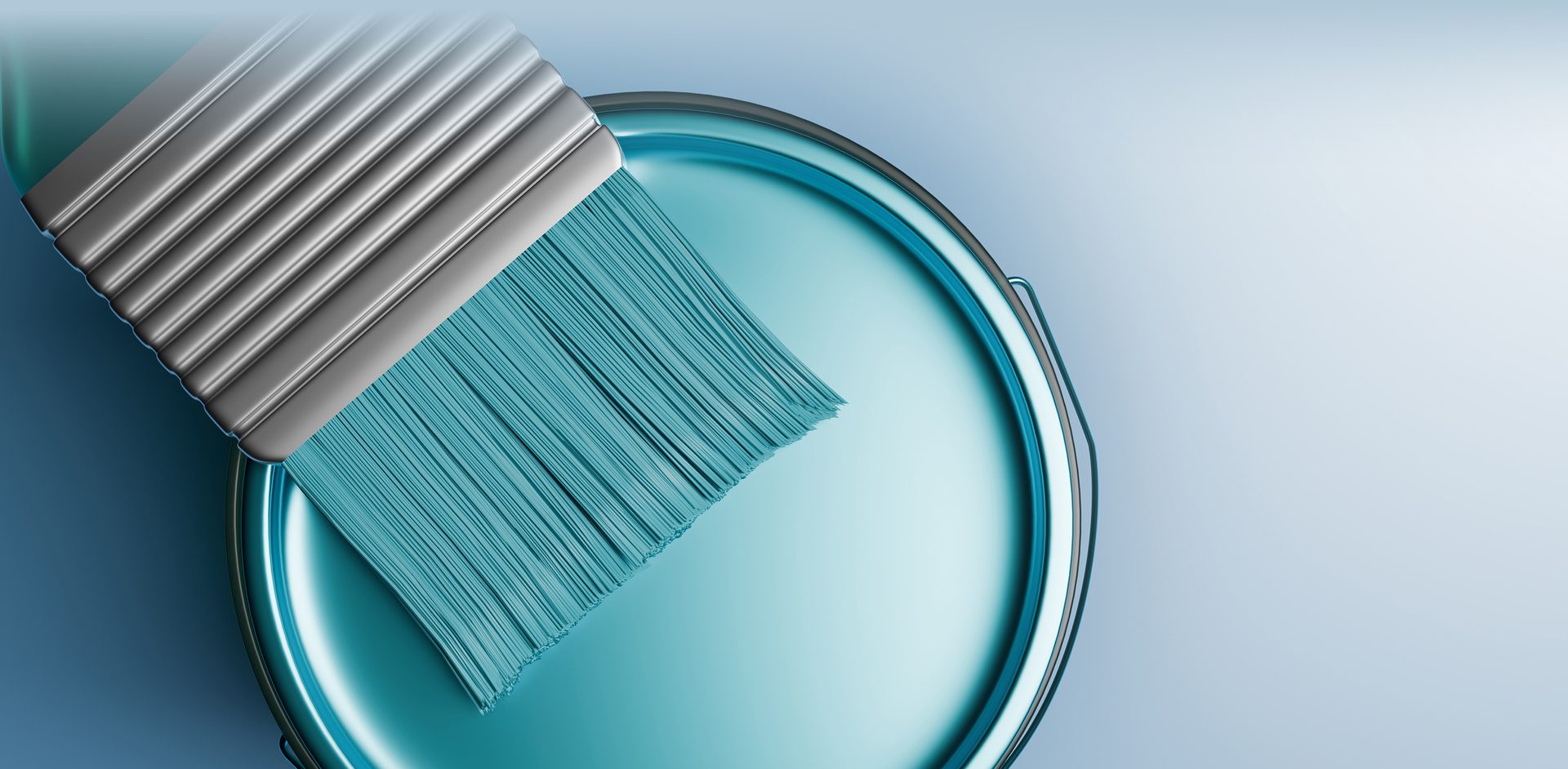 Aqua colored paint in can with brush