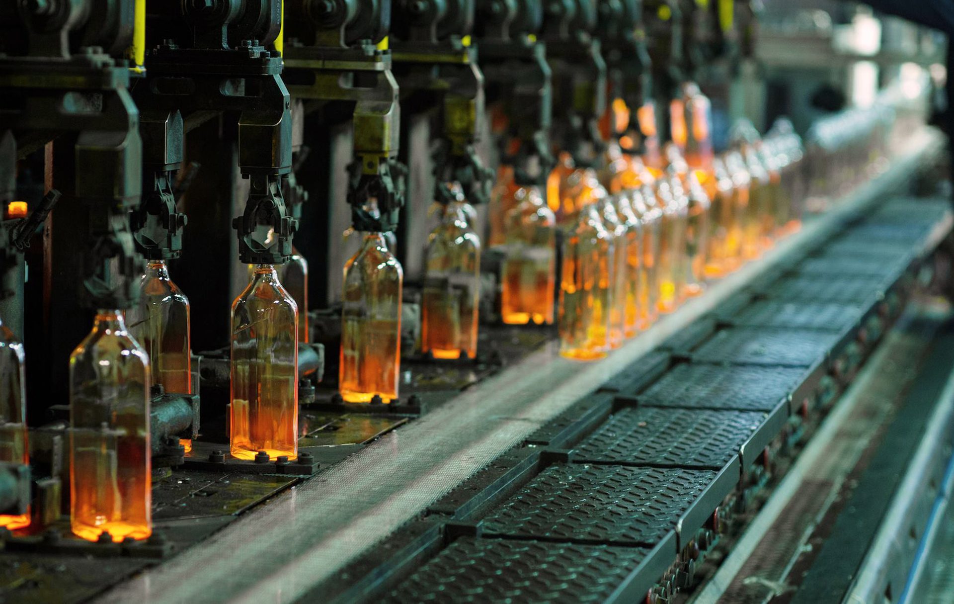 Glass bottles on conveyor