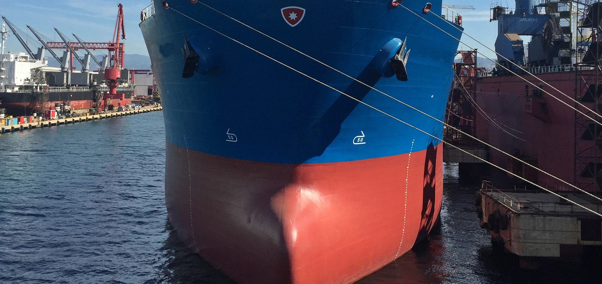 Ship and crane in shipyard