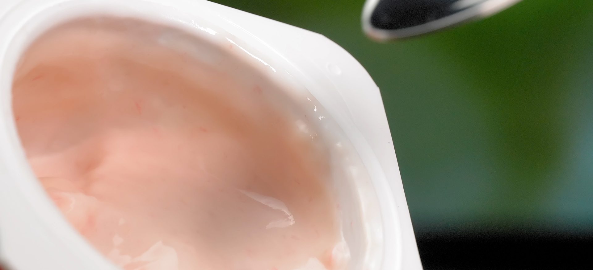 Getting a spoonful of yogurt