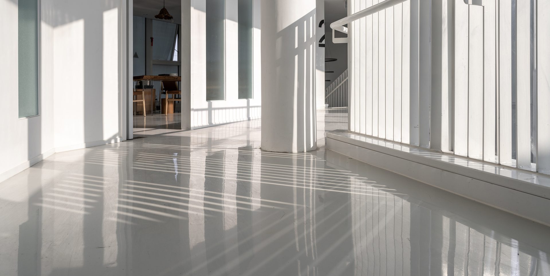 Sun shining through the window, showcasing the epoxy covered concrete floor