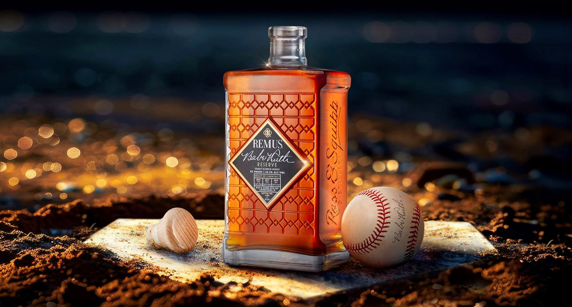 Remus Babe Ruth bottle on home plate with a baseball to its right