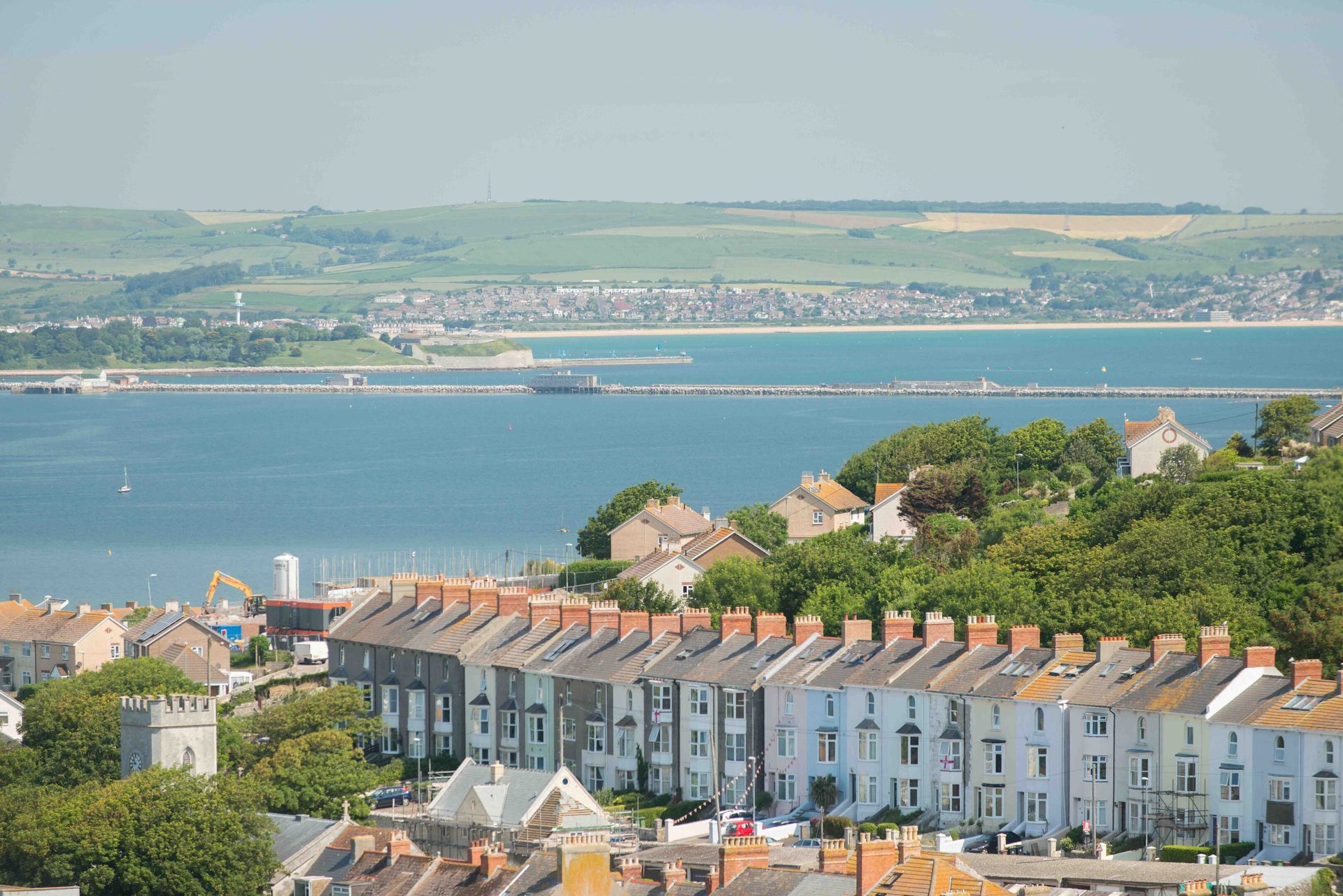 Coastal and oceanic landforms, Water resources, Urban design, Sky, Building, Azure, Lake, Condominium, Horizon