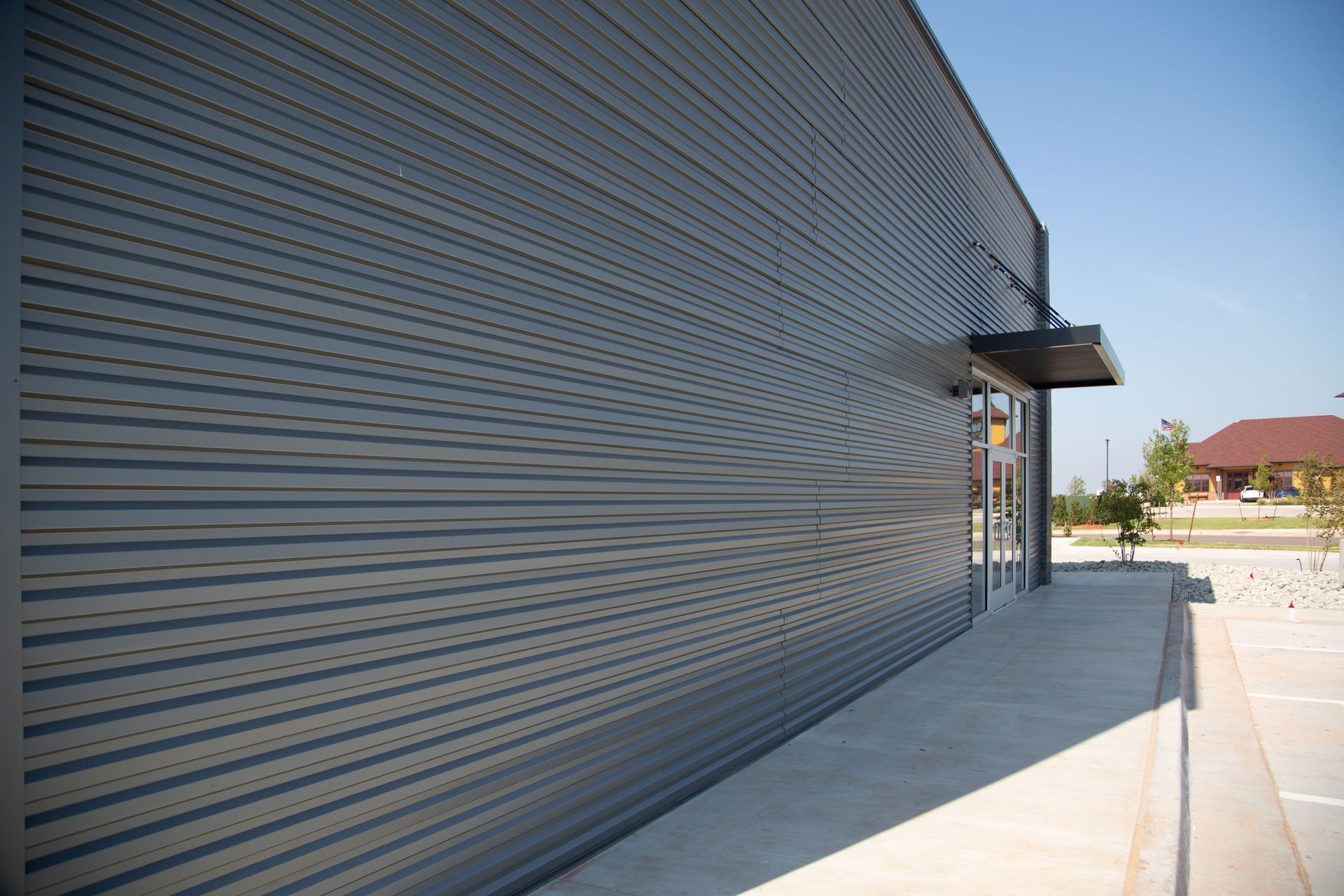 Metal Siding Installed On Sherwin Williams ICF Project