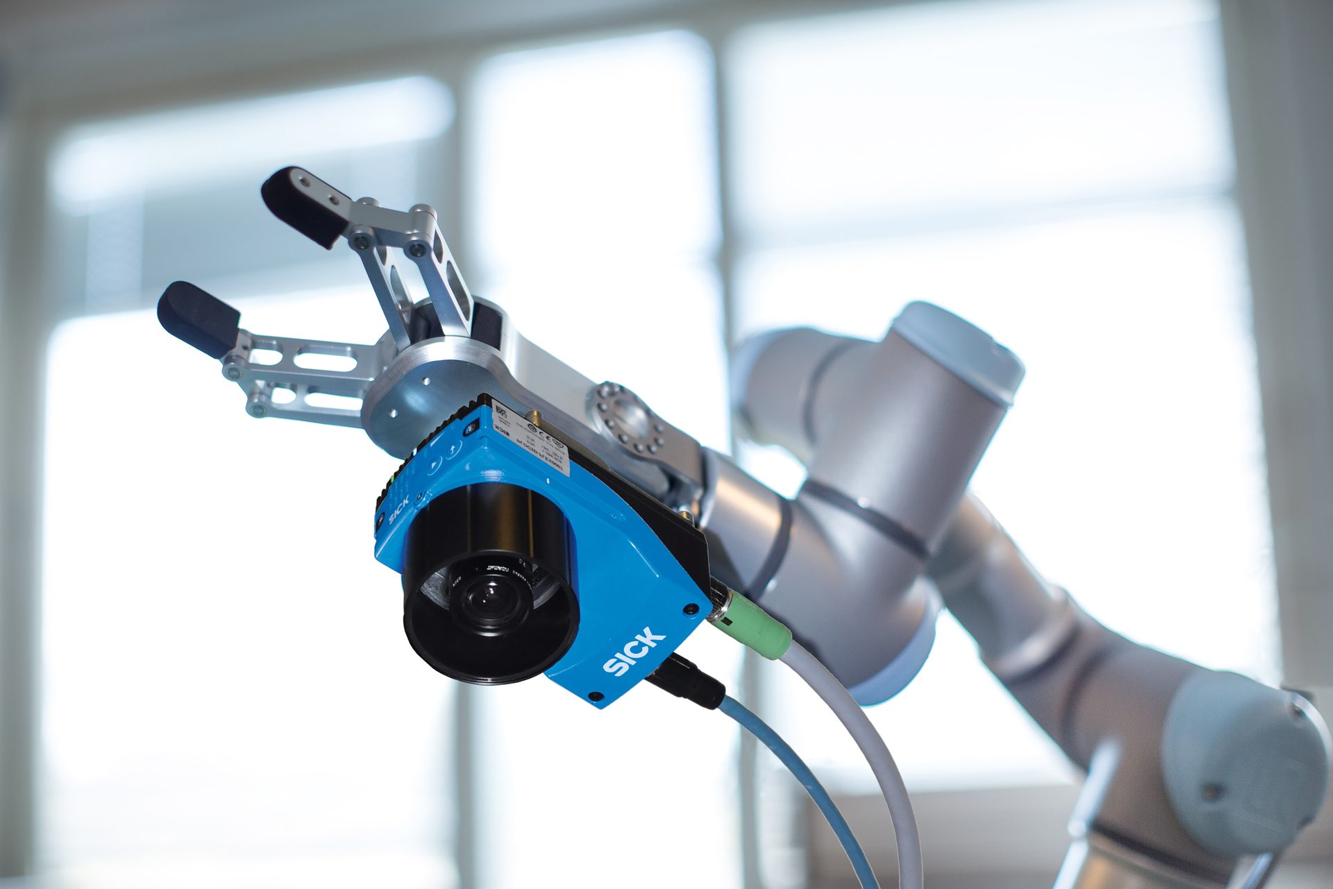 This is a 2D camera mounted to robot end of arm tool. The PLOC2D gives the position and size of the part so gripper can be used to pick up the object.