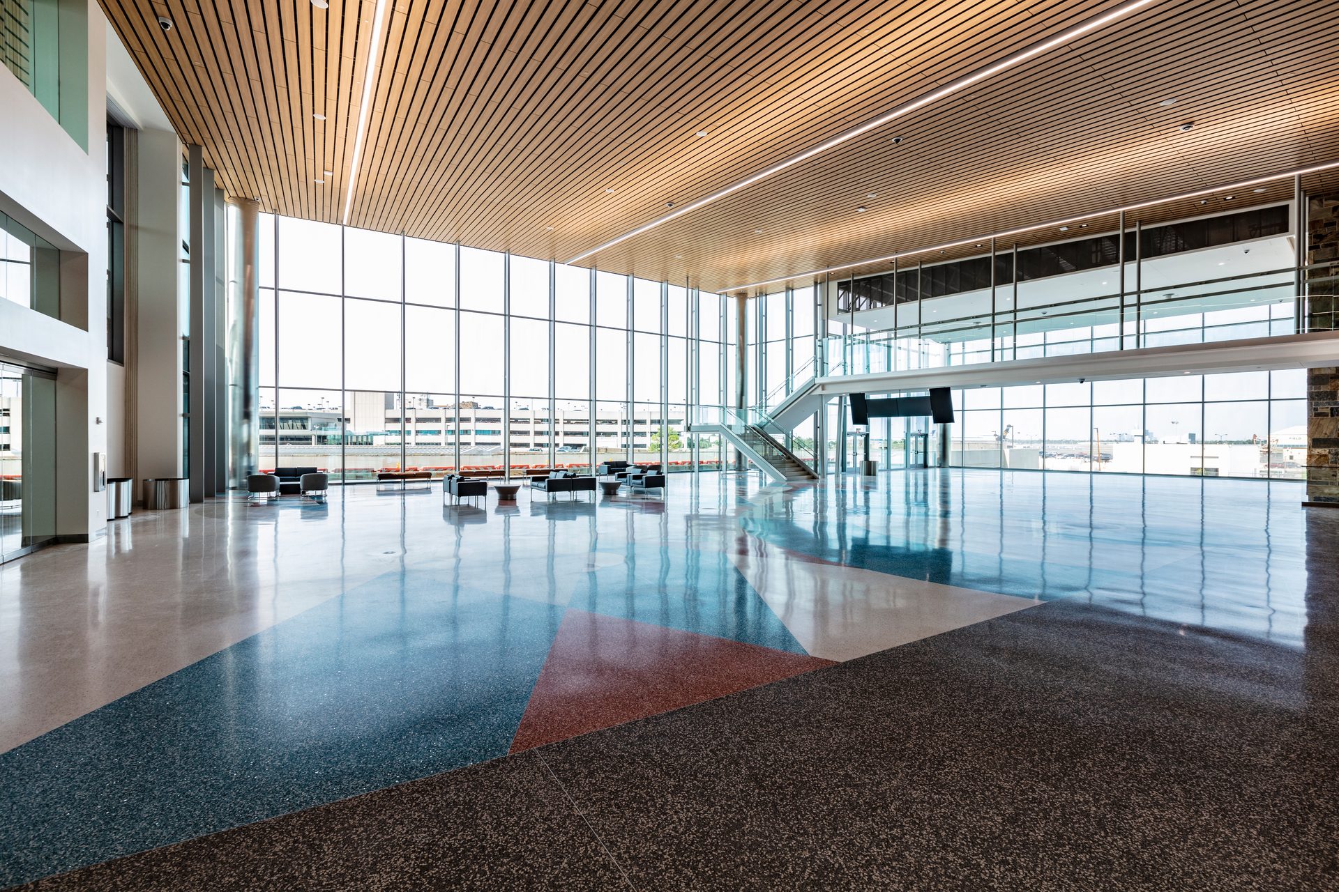 Glass curtain wall assemblies enhance building aesthetics and performance by supporting daylighting goals.