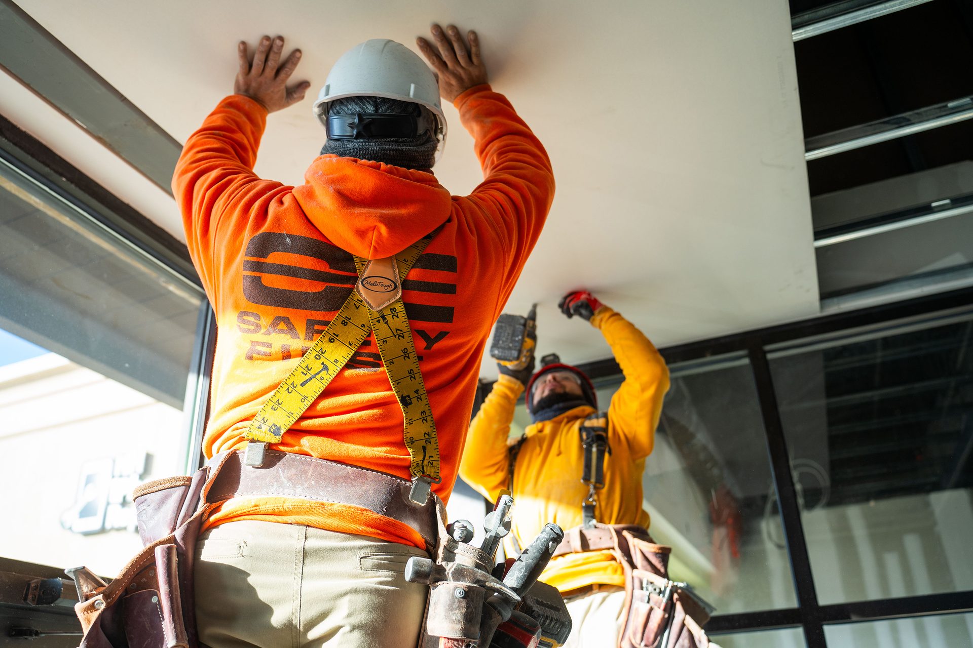 workers installing ceiling