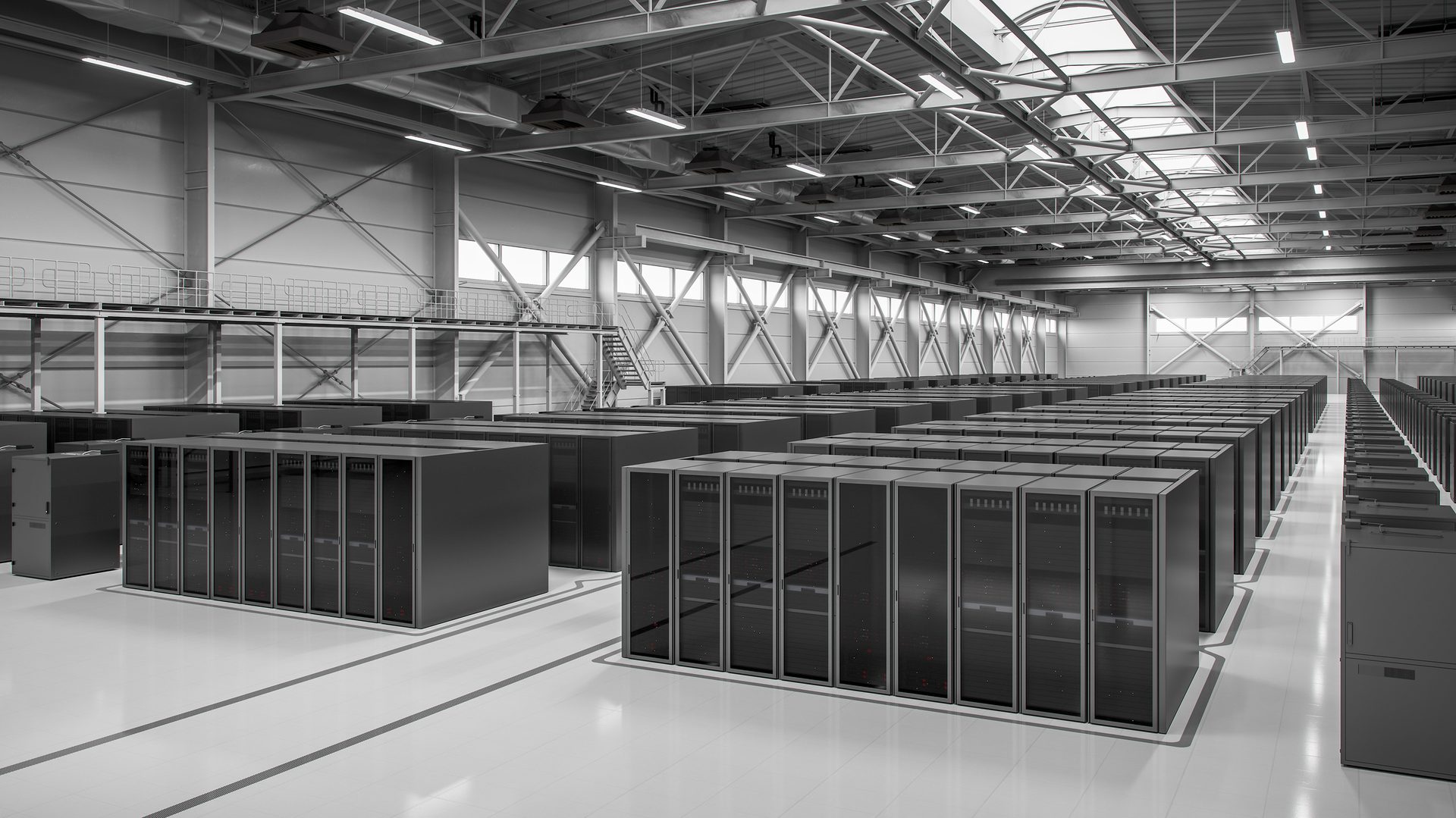 A large, modern data center with numerous rows of server racks under bright fluorescent lights.