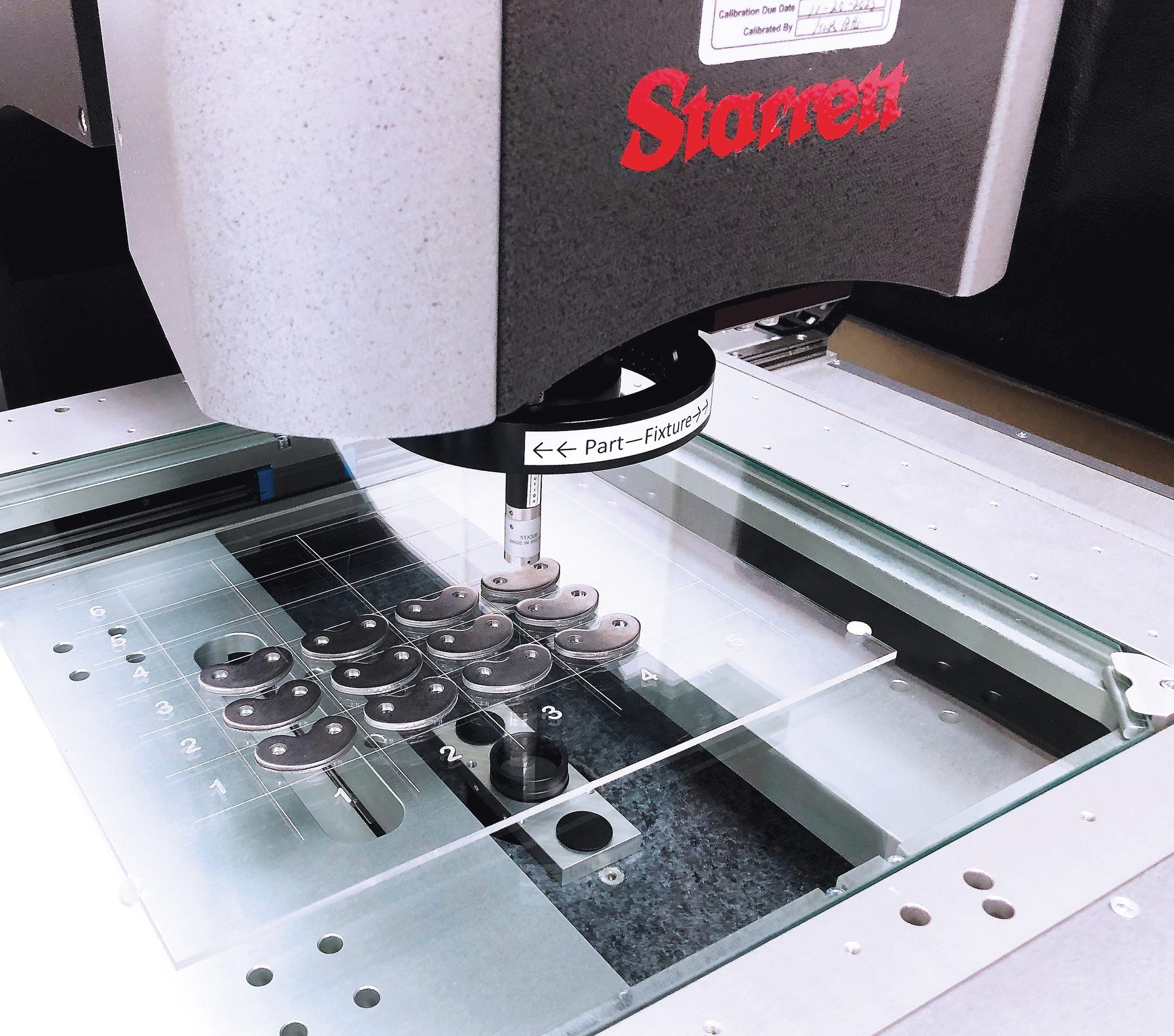 Rocker parts sampling set up in a palletized grid format on the Starrett AV450. 