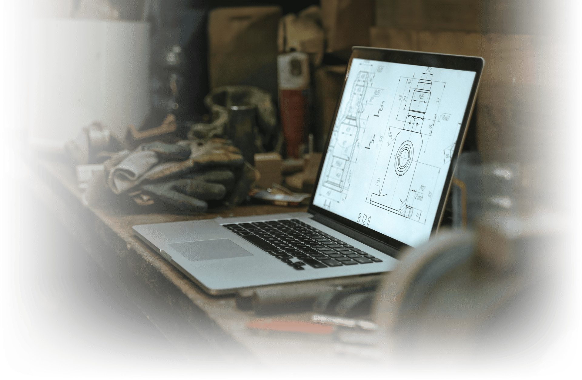 laptop with blueprint of bolt