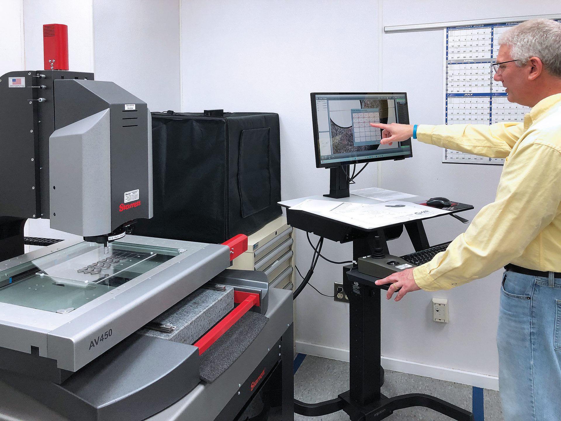 David Holland, CEI Quality Inspector, performs an efficient palletized inspection routine using automatic pattern recognition technology on stamped “rocker” parts. 