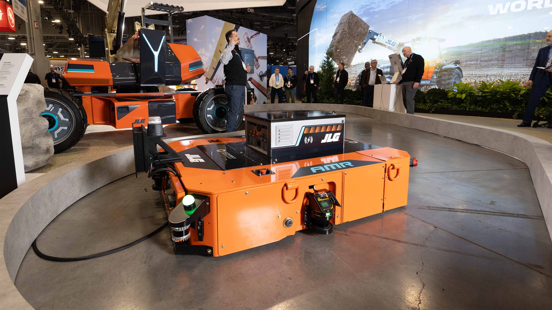 Orange JLG AMR and larger JLG vehicle at CES Expo