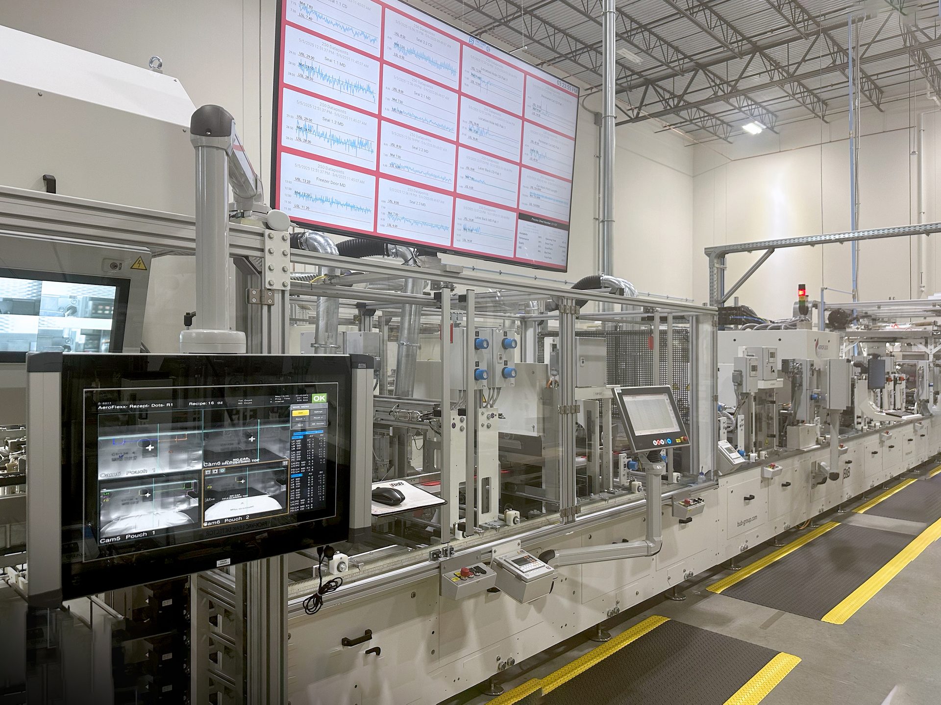 Automated manufacturing line with data and vision system displays.