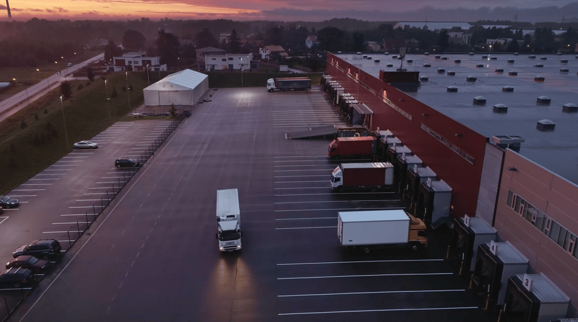 Mode of transport, Motor vehicle, Road surface, Sky, Water, Car, Truck, Asphalt, Architecture