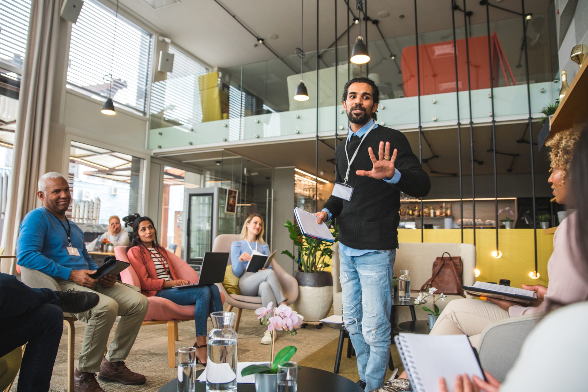 Musical instrument, Jeans, Trousers, Chair, Plant, Musician, Couch, Microphone, Guitar, Houseplant