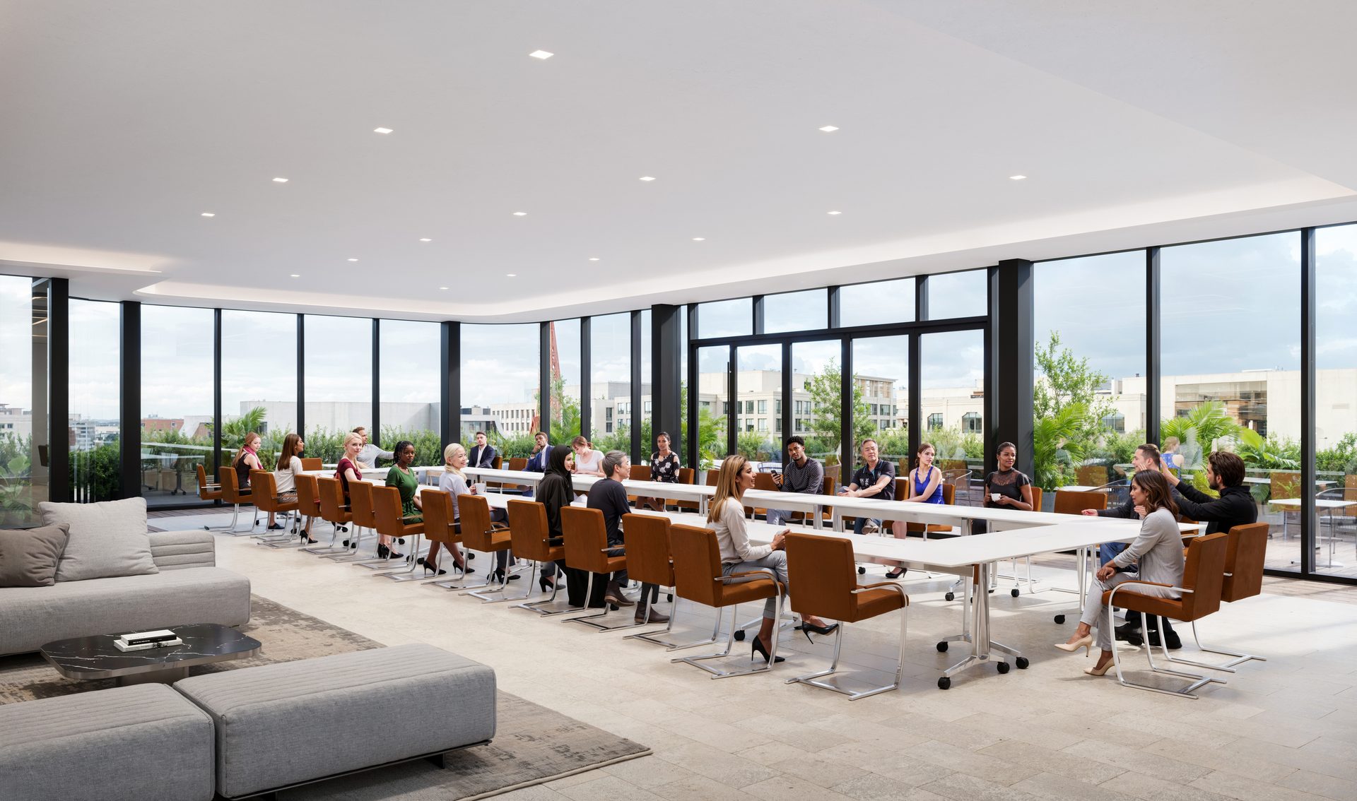Modern conference room with a U-shaped table, diverse people, and a city skyline.