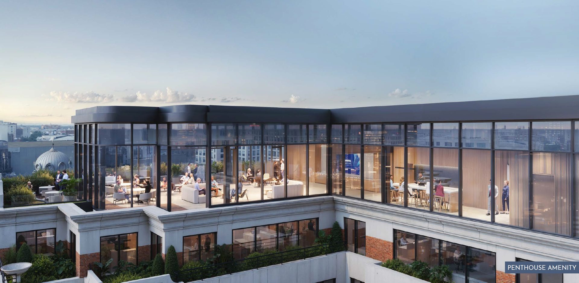 Rooftop penthouse amenity with people socializing and city views through glass walls.