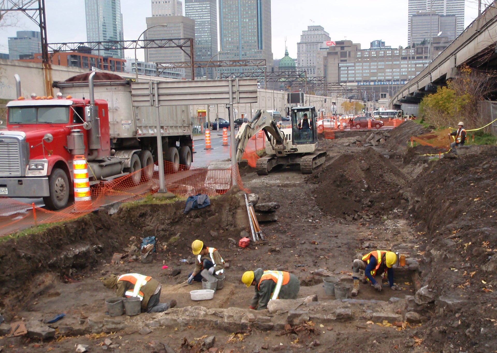 Road surface, Building, Vehicle, Tire, Infrastructure, Asphalt, Wheel, Truck, Slope, Wall