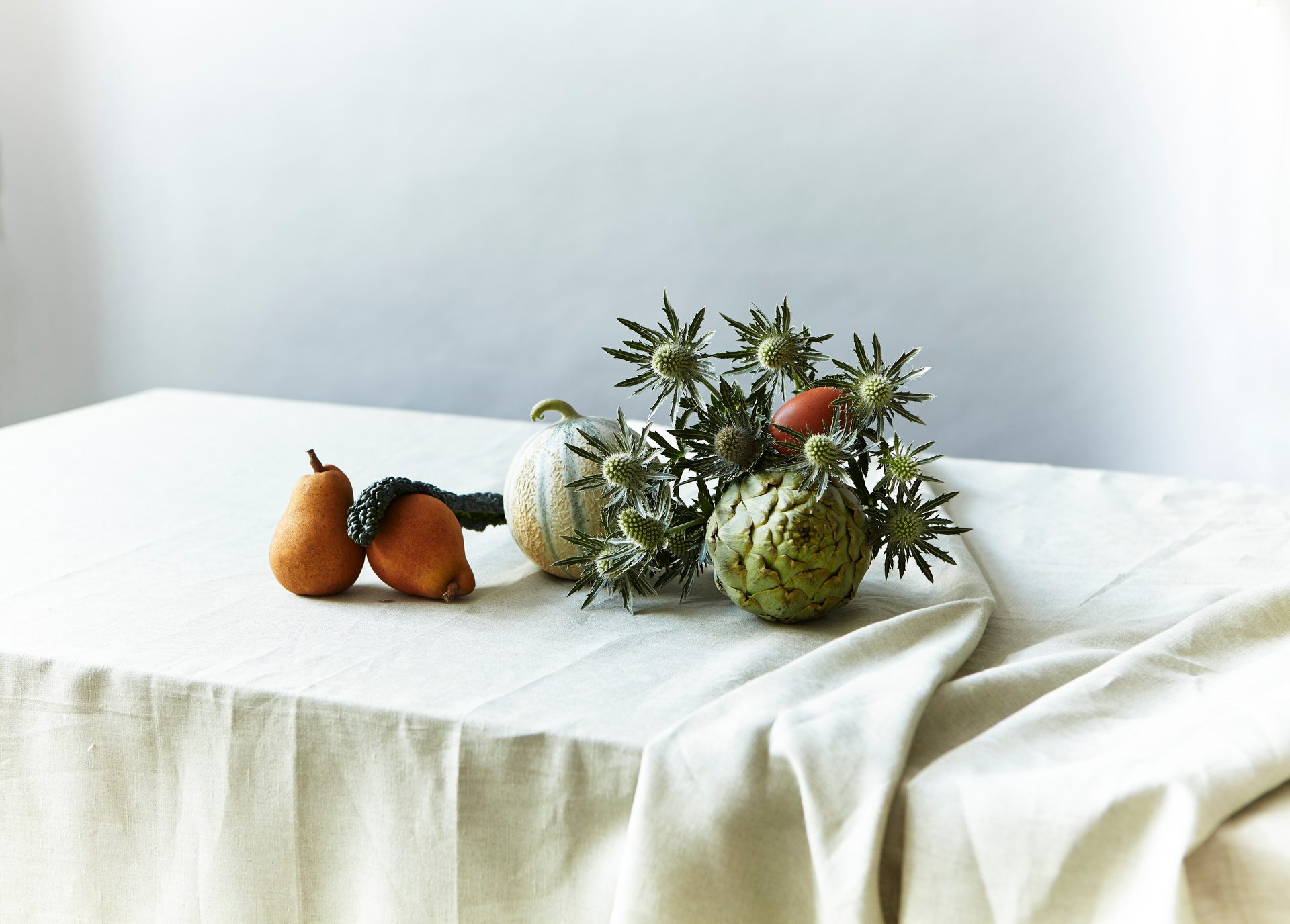 Natural foods, Pumpkin, Table, Food, Tablecloth, Orange, Fruit, Twig, Wood