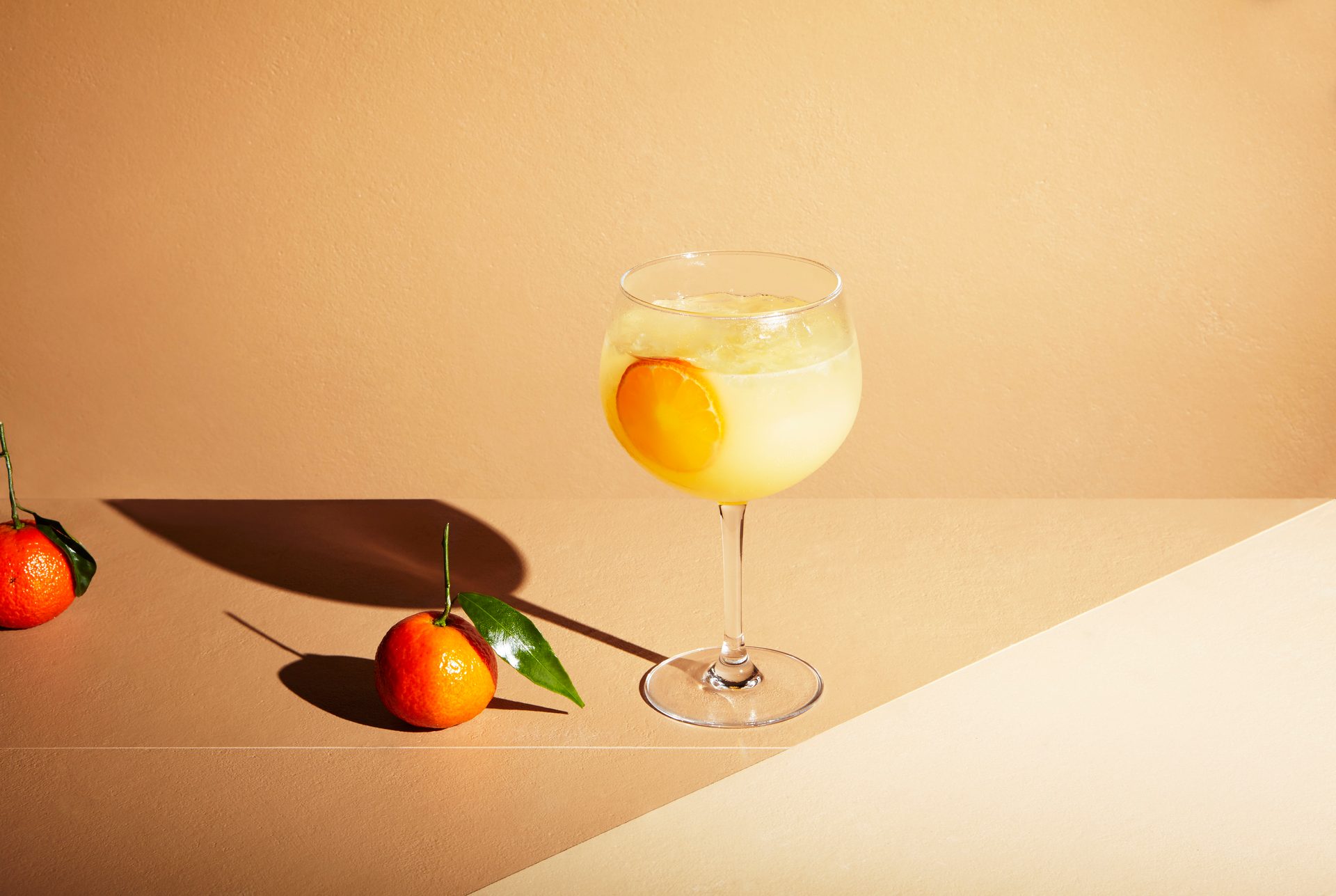 Wine glass, Tableware, Liquid, Stemware, Drinkware, Fruit, Orange, Clementine, Food, Table