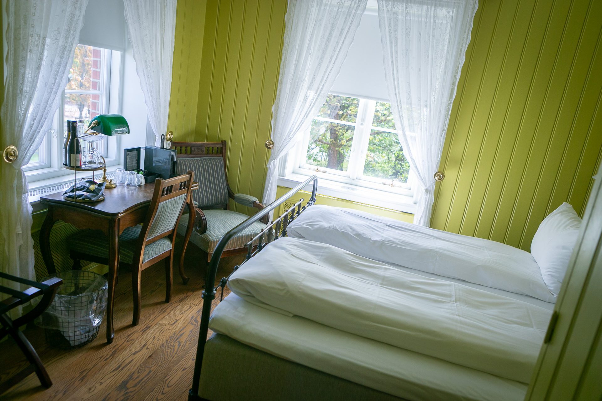 Interior design, Bed sheet, Wood, Furniture, Flooring, Bedroom, Floor, Home