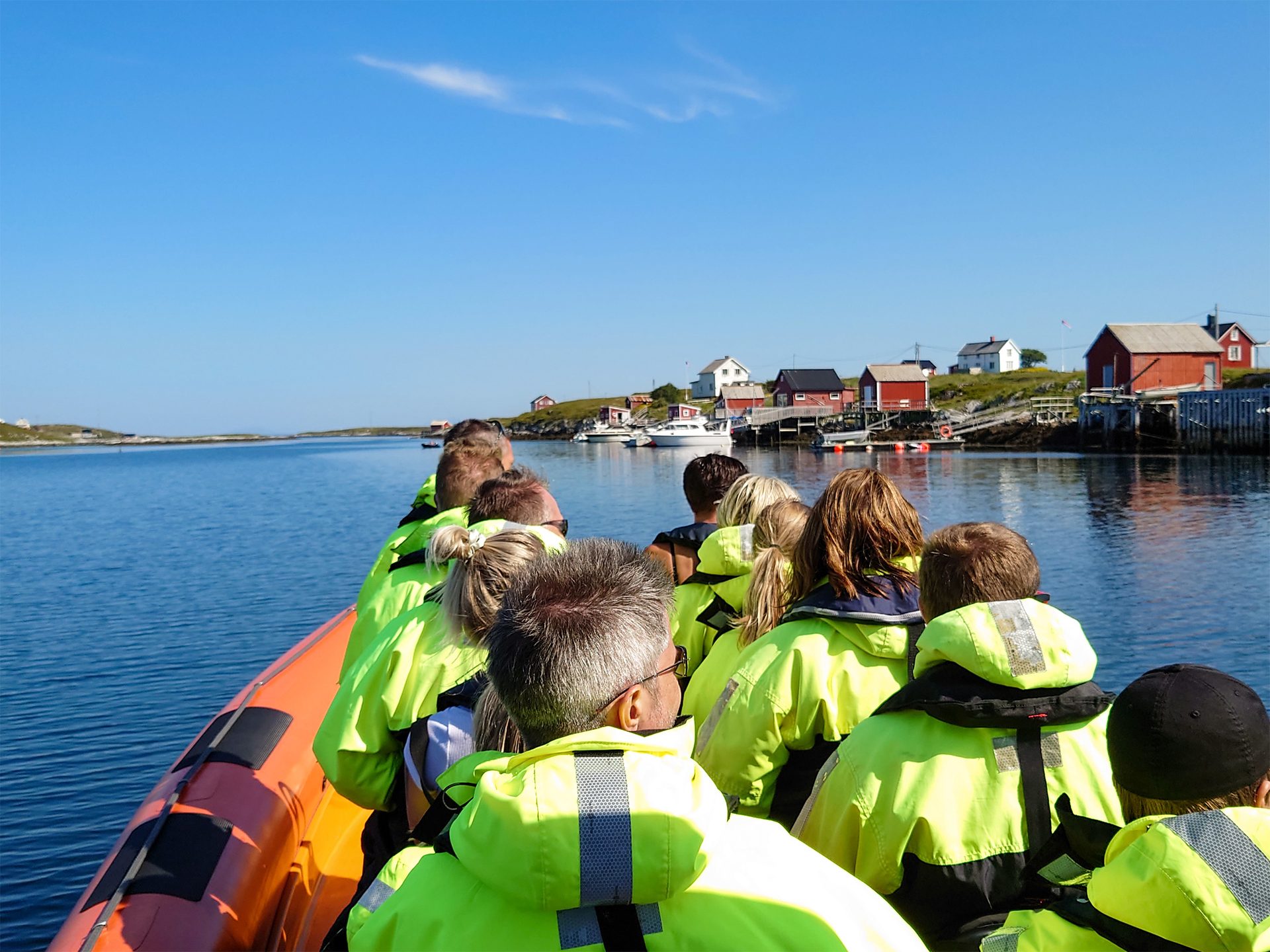 High-visibility clothing, Natural environment, Water, Sky, Workwear, Lake, Cloud, Travel, Vest, Jacket