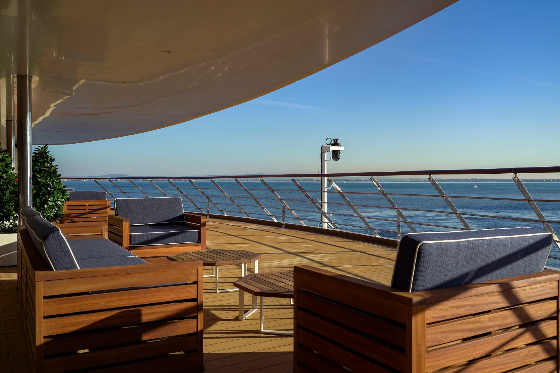 Outdoor furniture, Sky, Water, Property, Shade, Wood, Plant, Architecture, Rectangle, Line