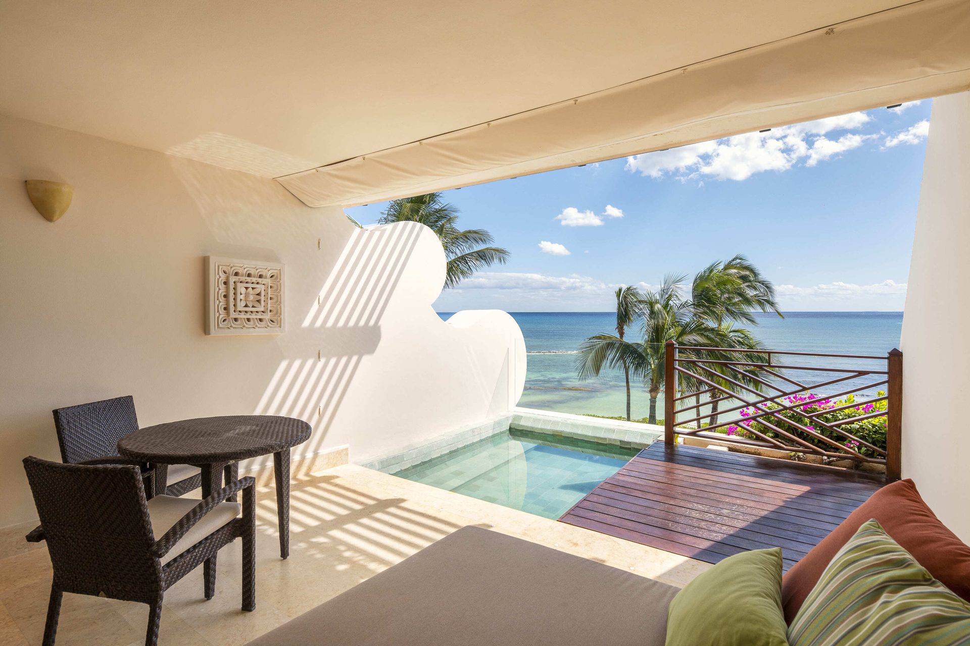 Seaside resort, Water, Sky, Building, Furniture, Plant, Azure, Shade, Table, Chair