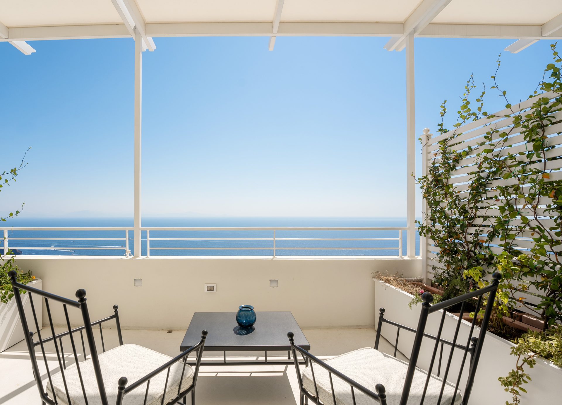 Interior design, Sky, Building, Water, Furniture, Property, Chair, Azure, Plant, Shade