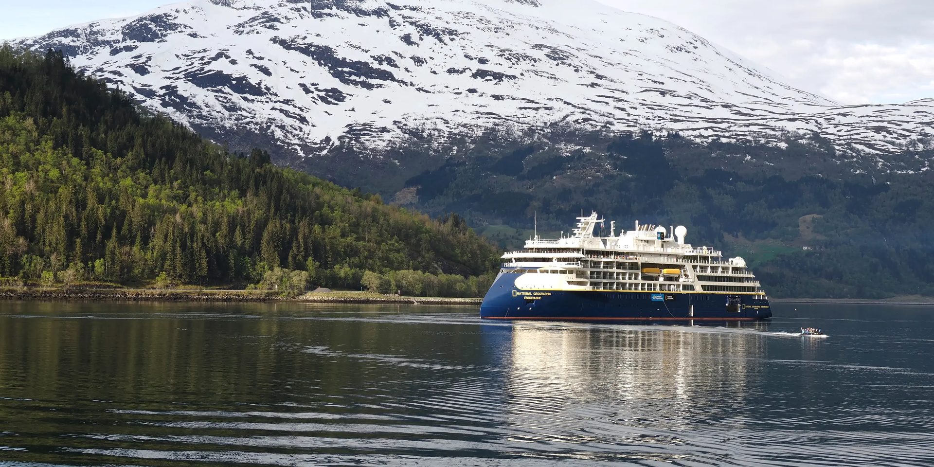 Naval architecture, Cruise ship, Water, Mountain, Boat, Vehicle, Watercraft, Snow, Lake, Highland
