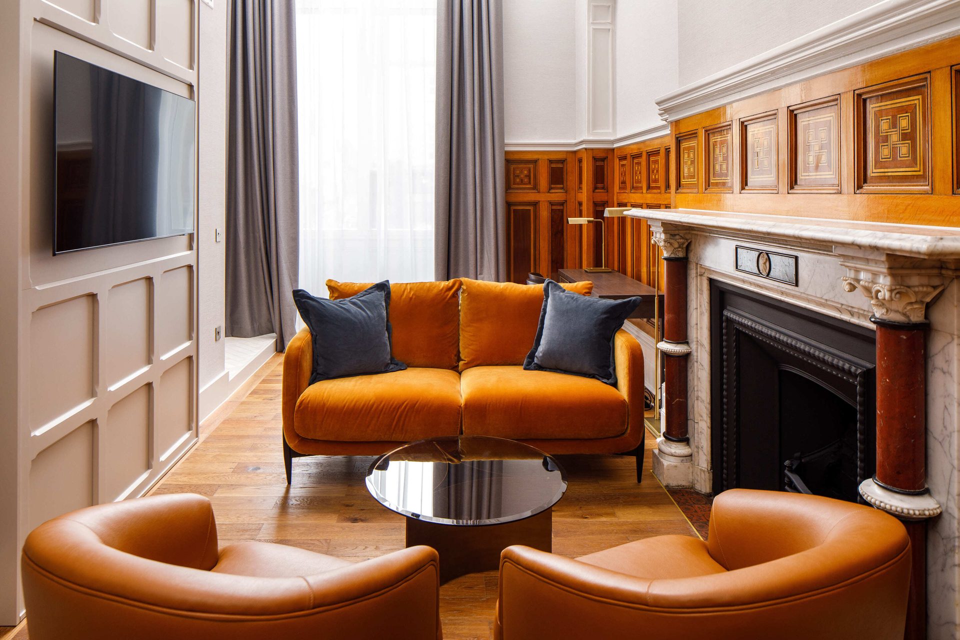 Interior design, Living room, Furniture, Property, Table, Chair, Wood, Orange, Flooring, Comfort
