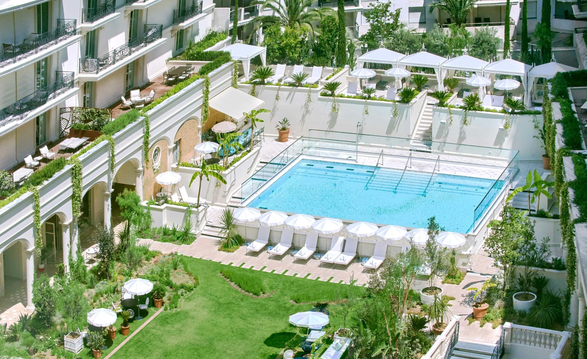 Swimming pool, Urban design, Outdoor furniture, Property, Plant, Water, Grass, Tree, Leisure, Window