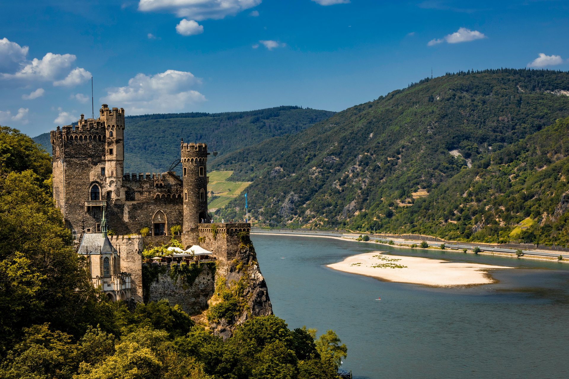 Body of water, Tourist attraction, Highland, Hill, Watercourse, Castle, Lake