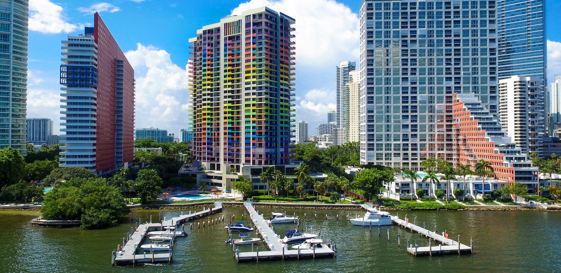 Tower block, Urban design, Water, Building, Skyscraper, Sky, Cloud, Property, Blue, Tree