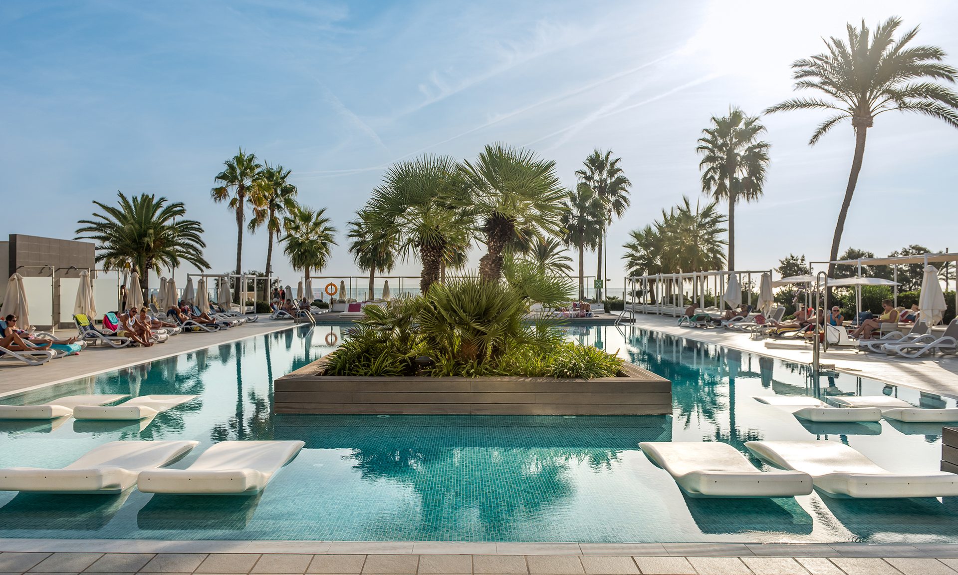Swimming pool, Outdoor furniture, Eco hotel, Seaside resort, Vacation, Leisure, Sunlounger, Shade
