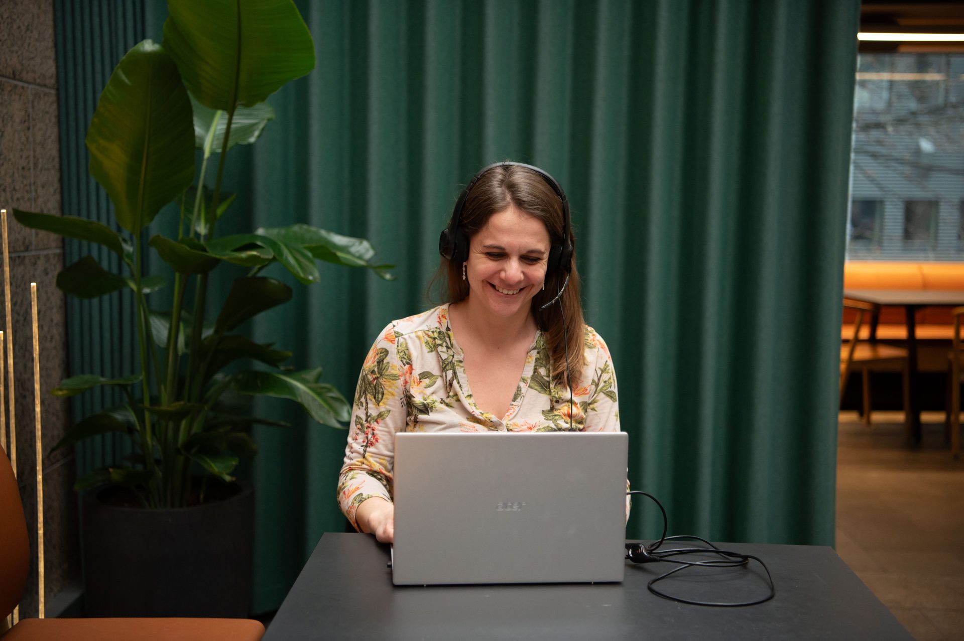 Personal computer, Plant, Table, Smile, Laptop, Microphone