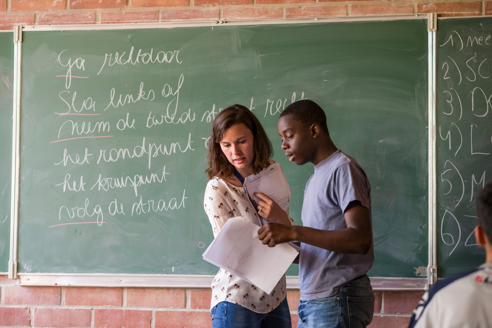 Jeans, Photograph, Handwriting, Human, Window, Gesture, Happy, Wall, Leisure, Blackboard