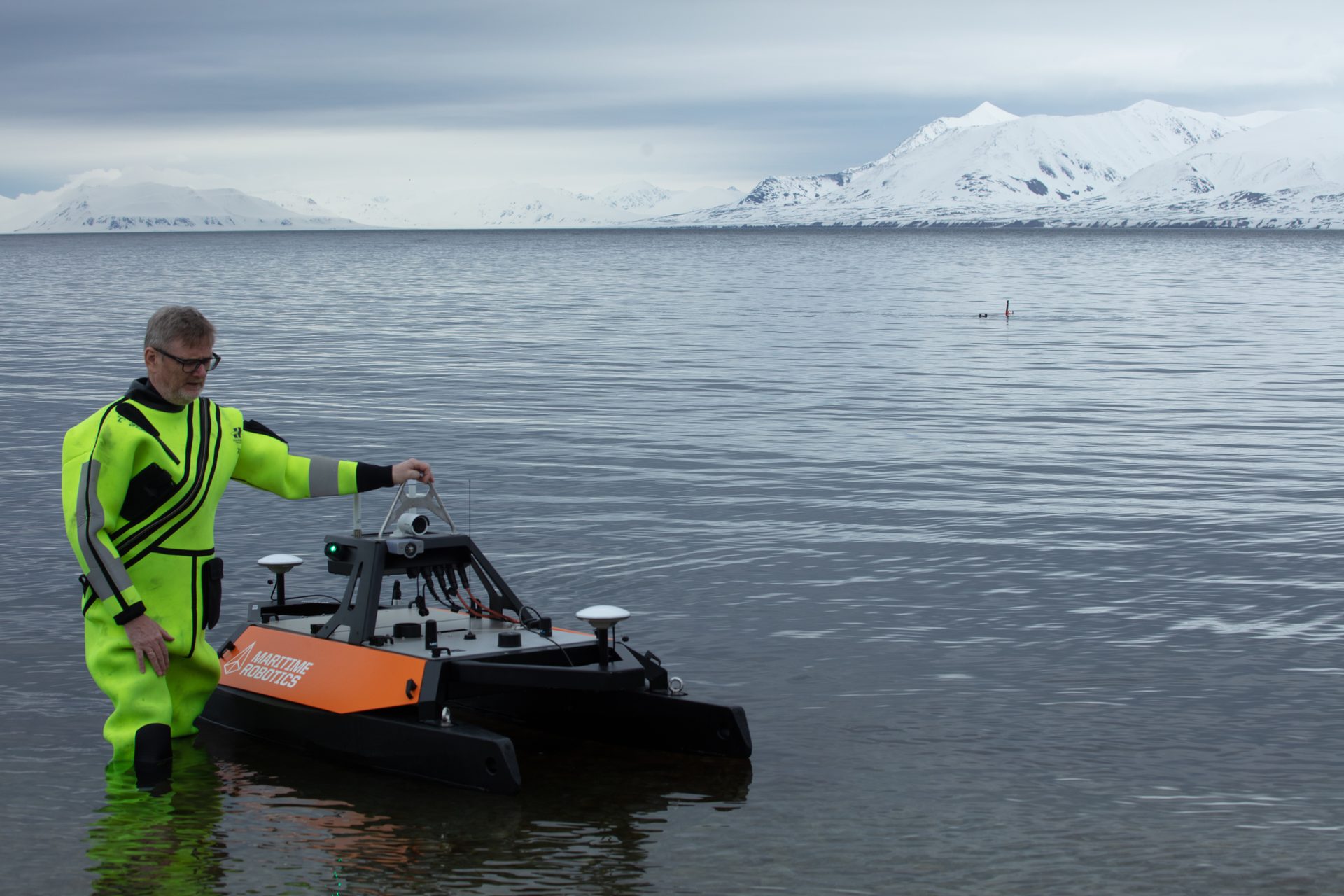 Boats and boating--Equipment and supplies, Water, Cloud, Sky, Boat, Watercraft, Vehicle, Mountain, Workwear, Snow