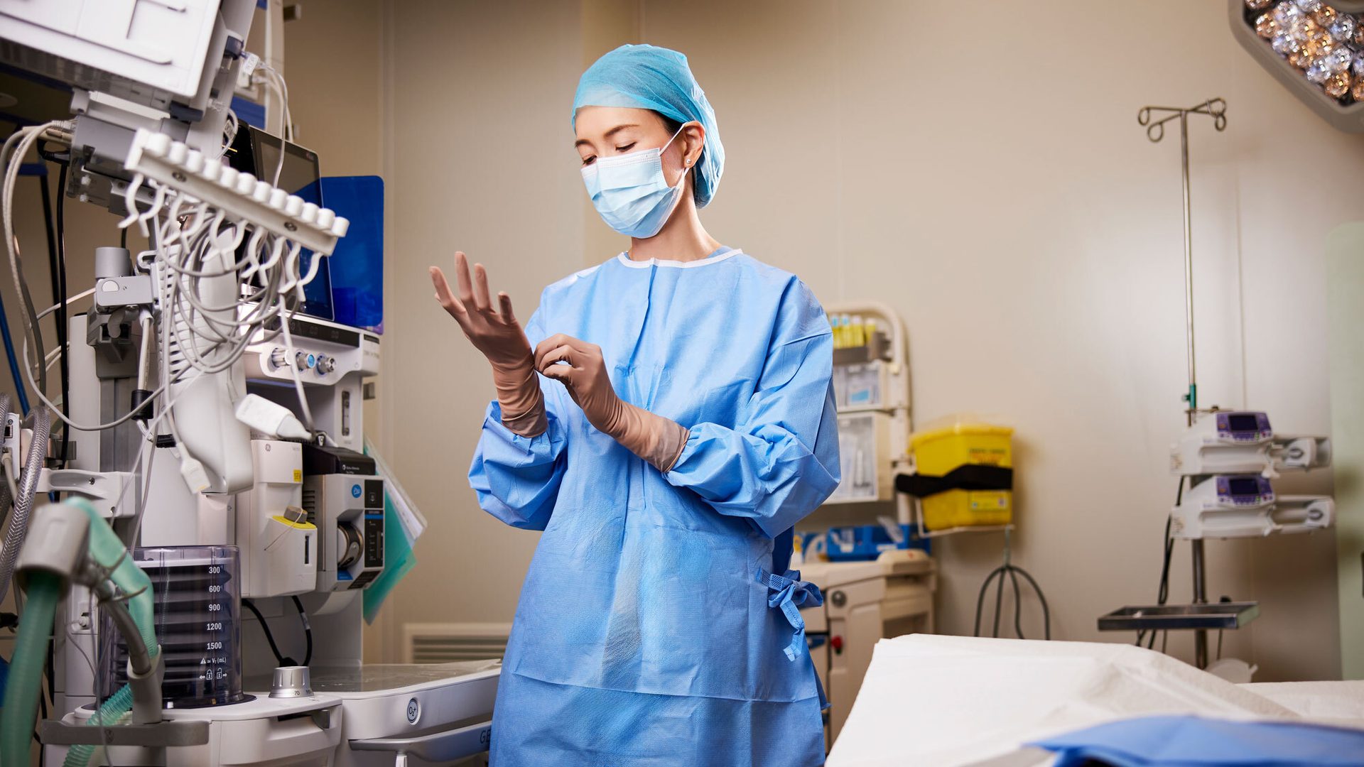Health care provider, Medical assistant, Safety glove, Scrubs, Surgeon, Research, Workwear, Scientist