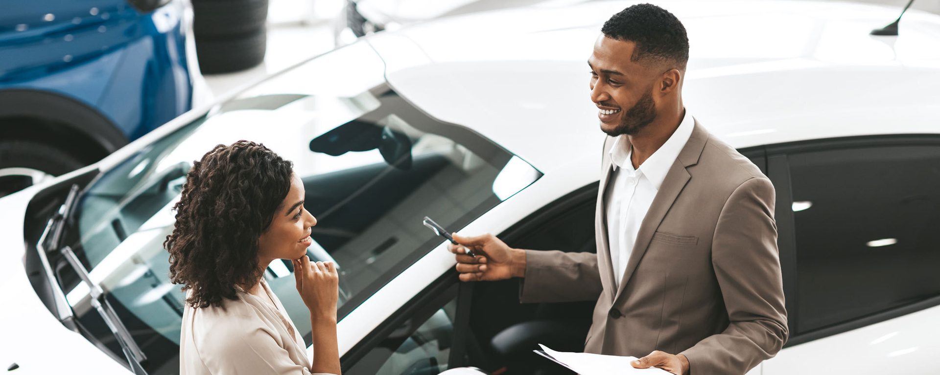 Personal luxury car, Automotive design, Motor vehicle, Hood, Gesture