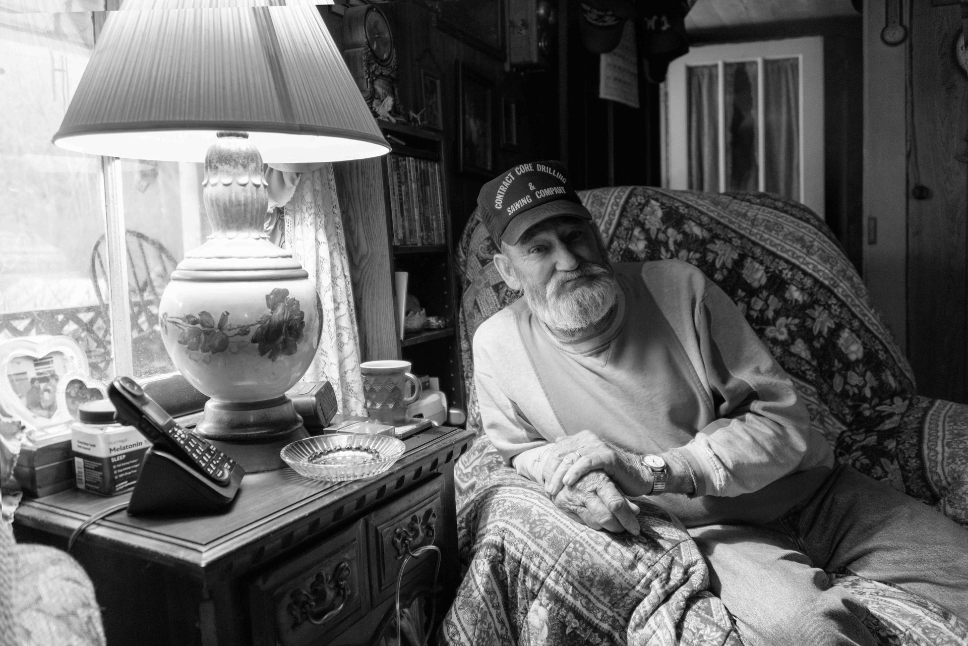 Facial hair, Furniture, Sitting, Beard, Moustache, Comfort