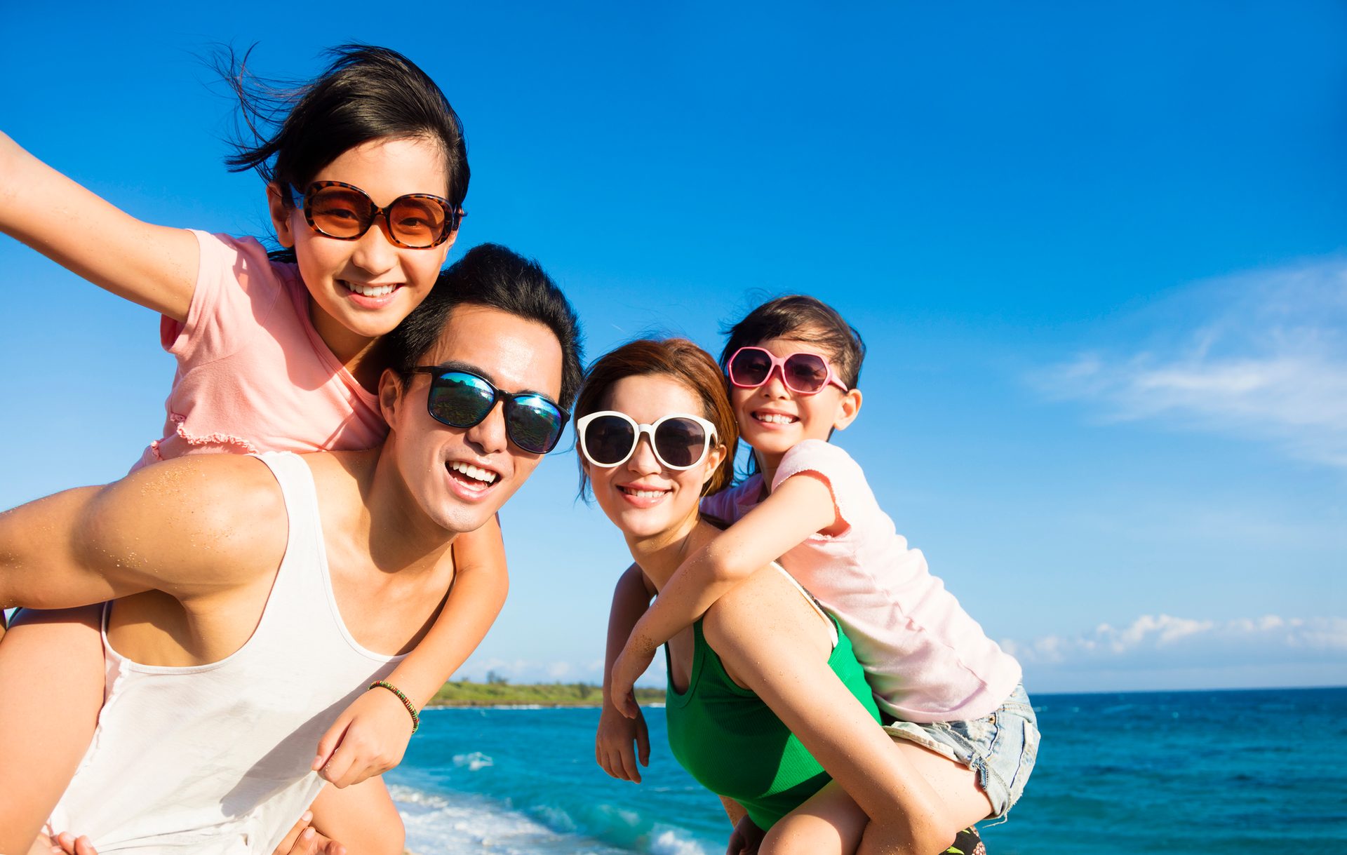 People on beach, Vision care, Smile, Sky, Glasses, Water, Goggles, Sunglasses, Blue, Cloud