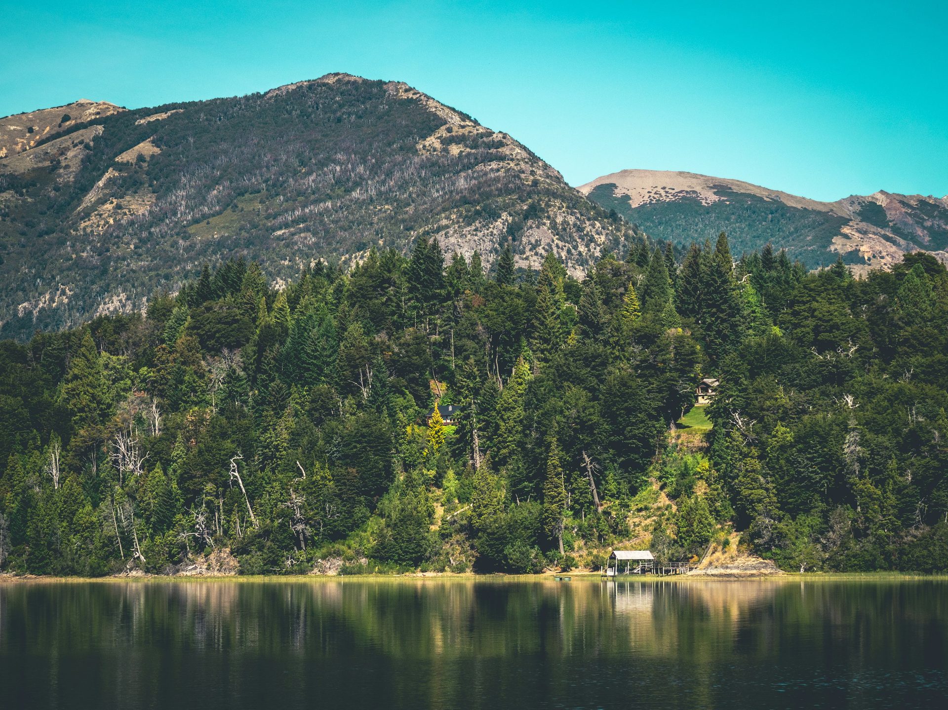 Body of water, Mountainous landforms, Natural environment, Sky, Mountain, Green, Nature, Tree